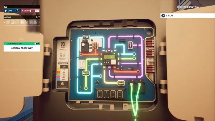 The open back of the floating rock display with the coloured power charges seated on its circuit board