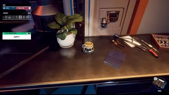 The Wavelength Sensor on the desk beside a journal and a potted plant