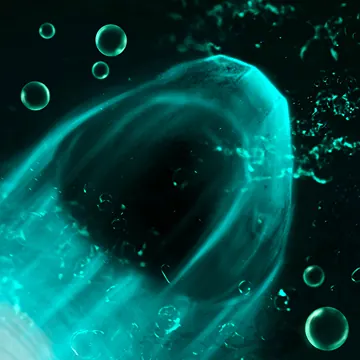 Boulder Burst, a dark boulder ringed in green energy and bubbles